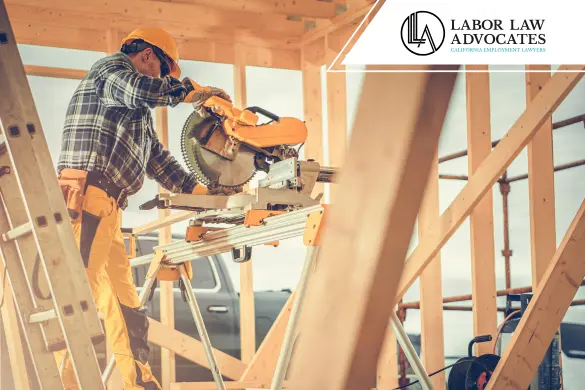 Construction Worker Using Wood Saw