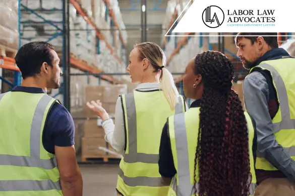 Warehouse workers collaborating.